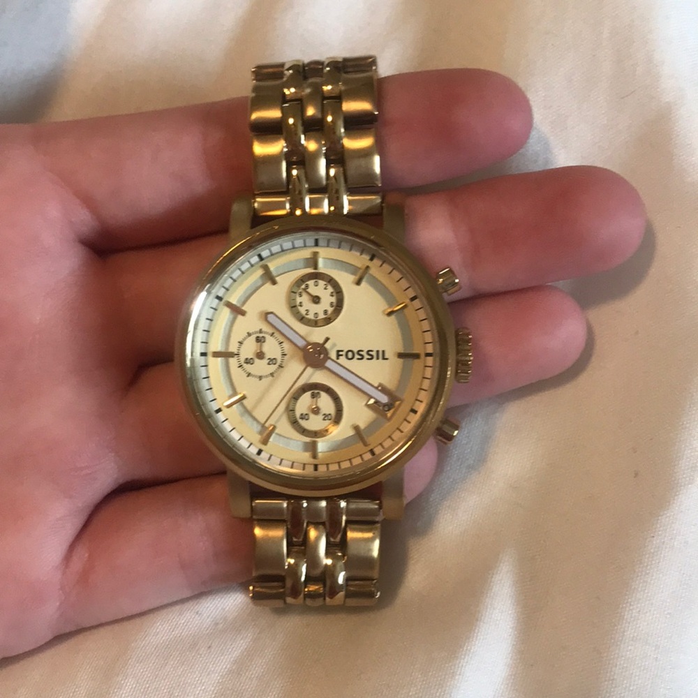 Gold fossil watch
